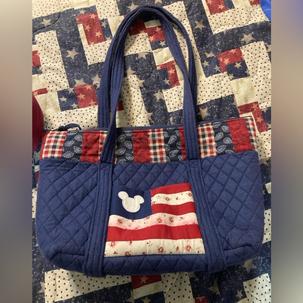Mickey Mouse Patriotic quilted bag.14" x 10". Used. Zipper & 6 pockets on inside